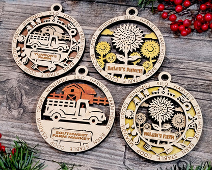 2 versions of the Farm Truck ornament and sunflower ornament are displayed, showing the icon version and non-icon versions.  Icon versions include small icons that circle around the center image